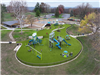 Aerial view of completed playground with children playing