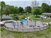Shaded play area with new splash pad equipment