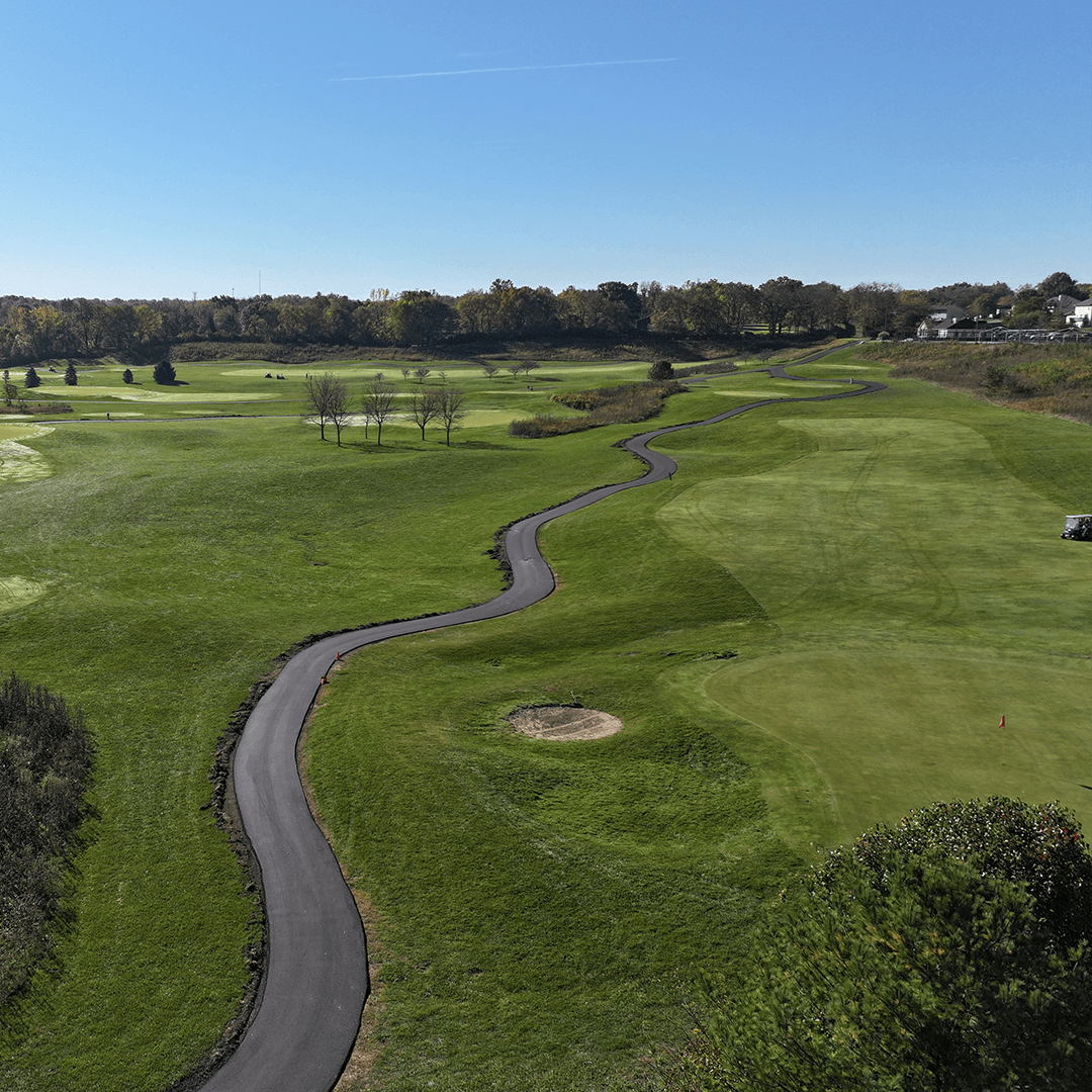 Picture of North Trace Golf Course, showing fairways and trees. 