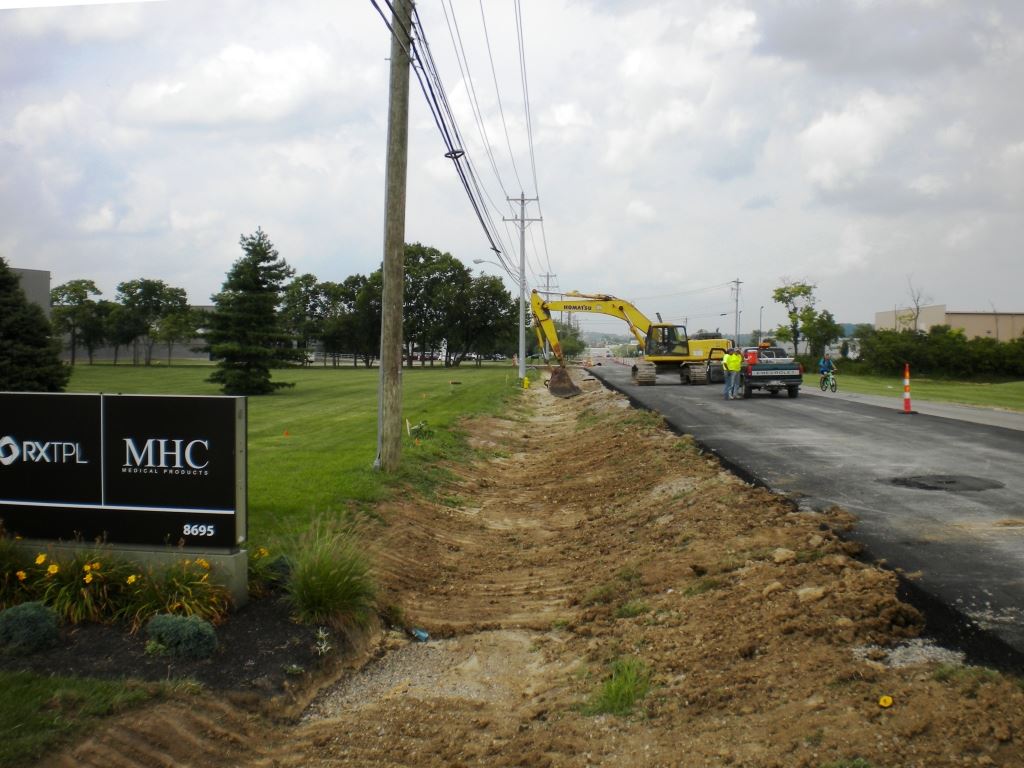 Completing West Side Drainage Ditch